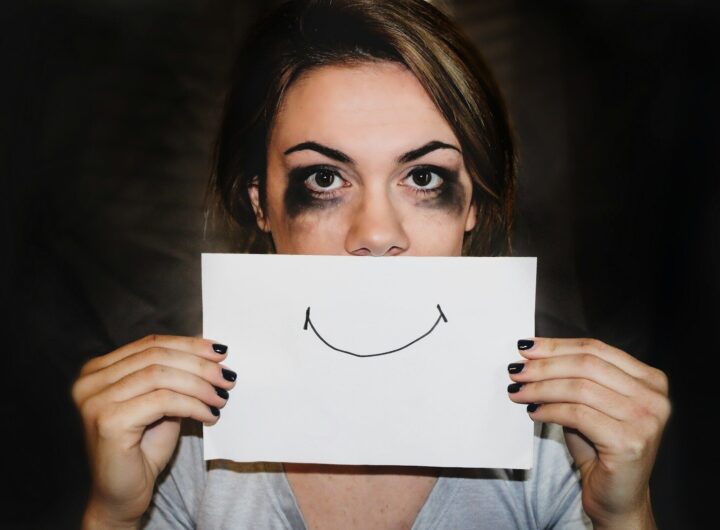 person holding white printer paper