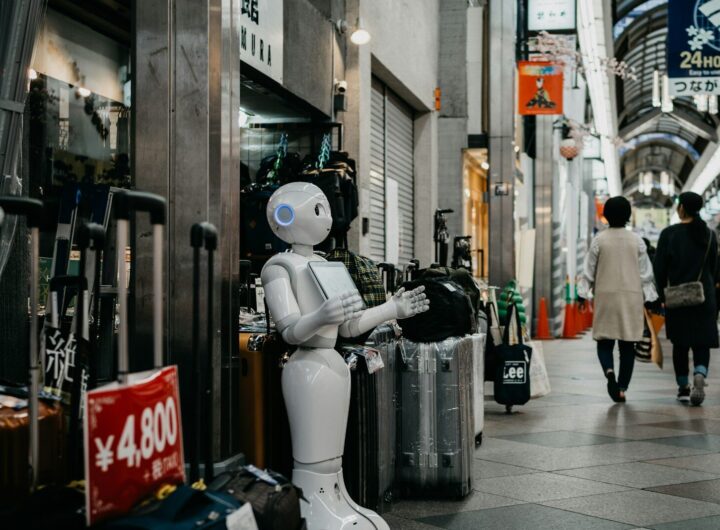 robot standing near luggage bags